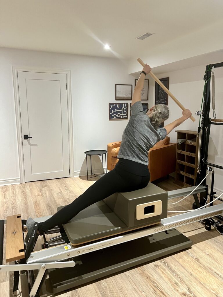 Mermaid Prep on Pilates Reformer for treatment of low back pain.